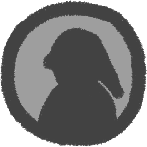 a grey / silver circle with a darker outline with a silhouette of a person looking to the left, the chest connects down to the edge of the coin and the person has long hair